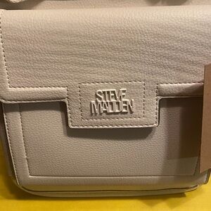 Original brand new Steve Madden Crossbody bag the color is bone